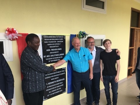 Family Photo Trevor Jones, son Dean and grandson Cole representing the family at the official opening of a women's residence in Tanzania, East Africa in September 2019