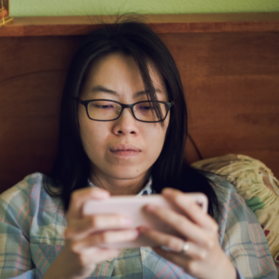 Asian woman with cell phone Asian woman with cell phone